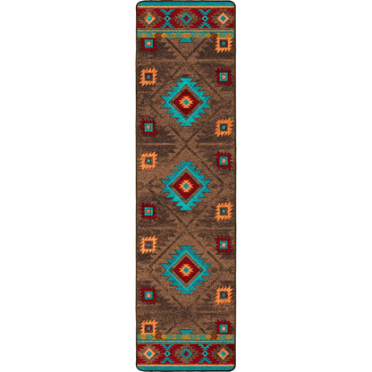 Patterned rug with geometric design on a white background